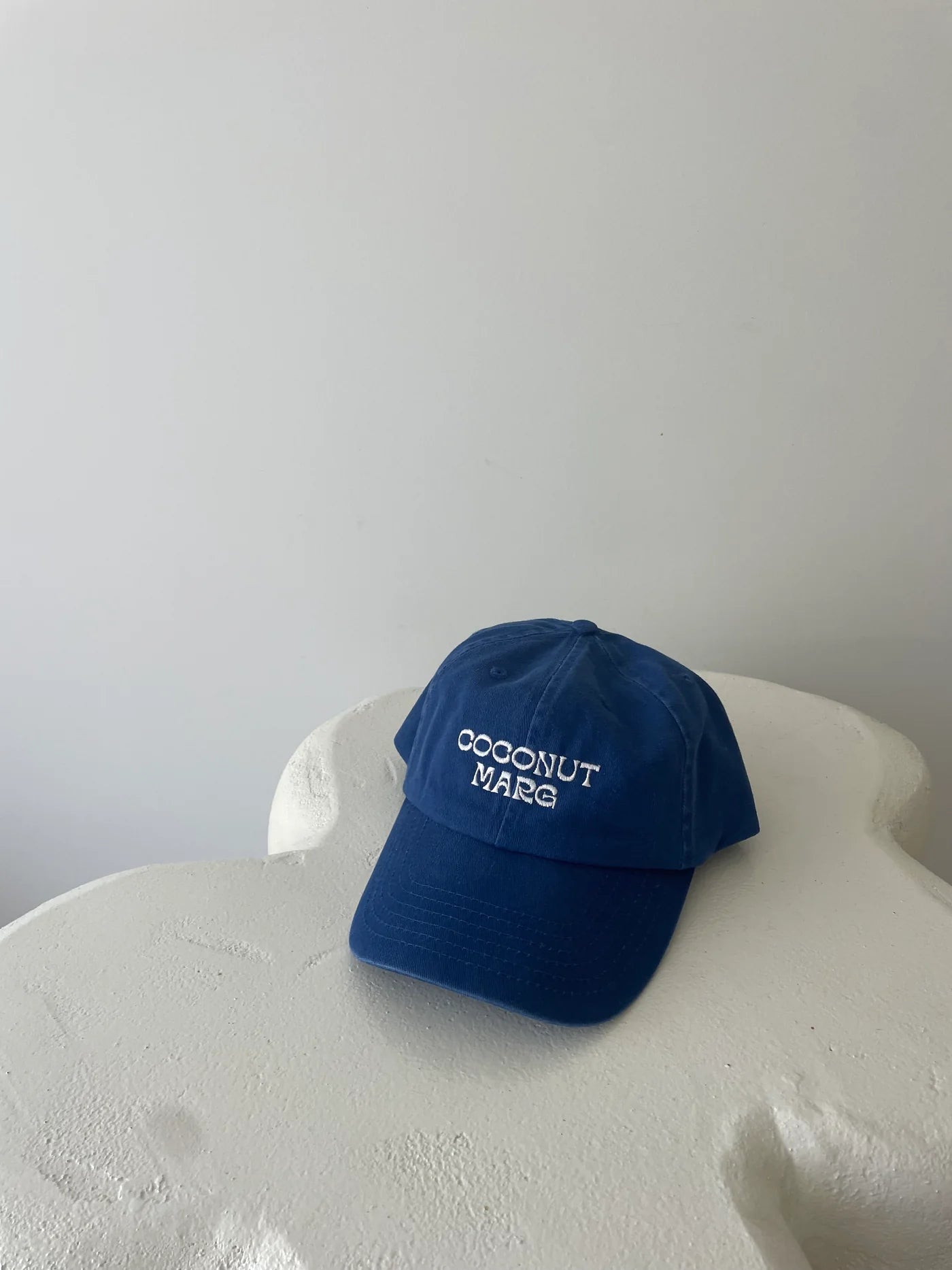 NEAR THE SEA- COCONUT MARG CAP