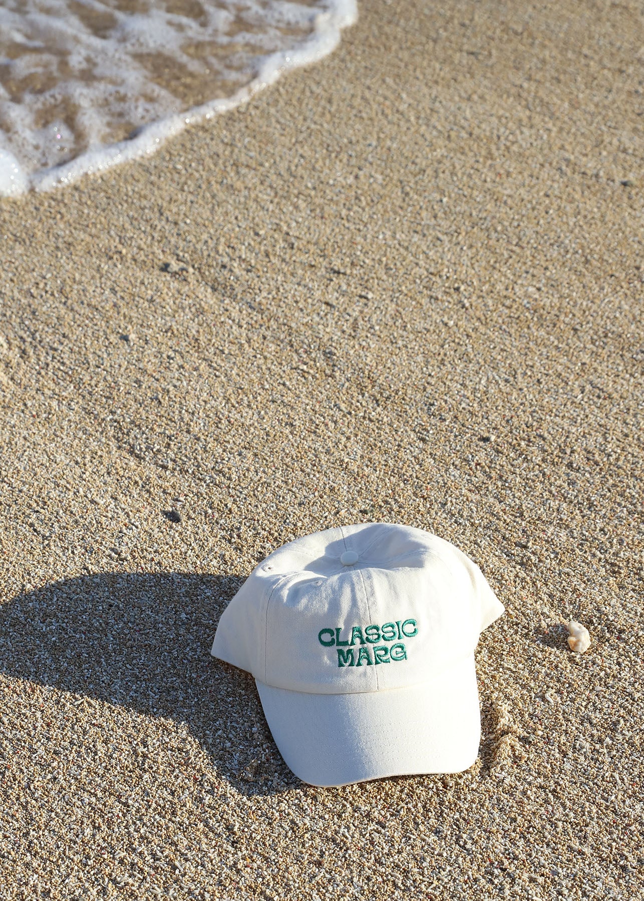 NEAR THE SEA- CLASSIC MARG CAP - CREAM